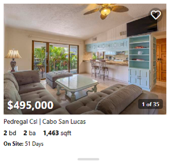Modern beachfront property in Pedregal with floor-to-ceiling glass and direct beach access.