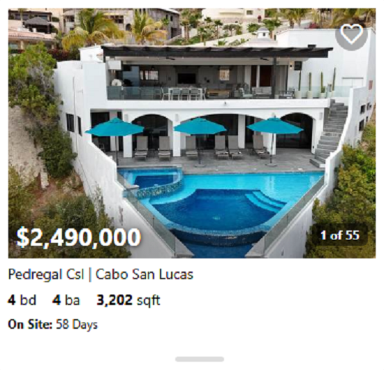 Modern beachfront property in Pedregal with floor-to-ceiling glass and direct beach access.