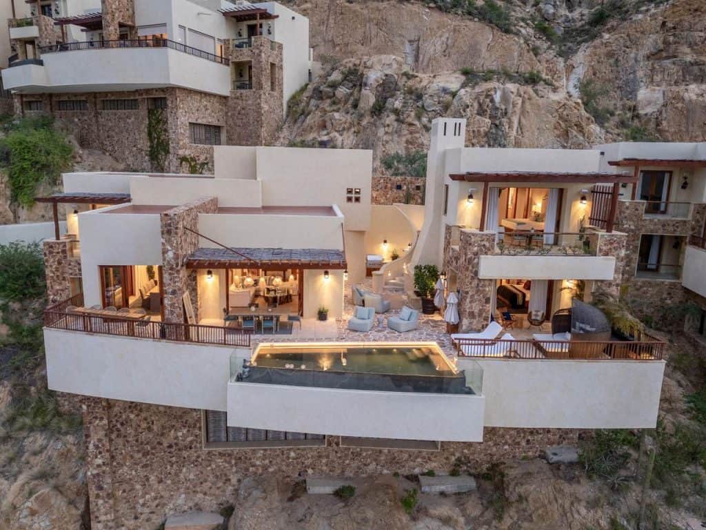 Inside The Waldorf Astoria Residences At Pedregal: What You Get When You Own β Homes For Sale In Pedregal A Serene, Luxury Villa At Waldorf Astoria Residences Overlooking The Pacific Ocean At Sunset, Nestled Into Cabo San Lucas Cliffs.