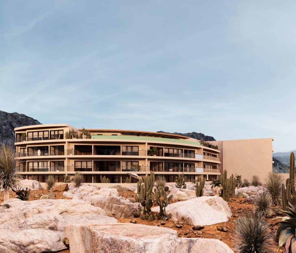 Investment Potential Of Branded Residences In Pedregal Cabo (2025) — Why These Luxury Homes Outperform – Homes For Sale In Pedregal Modern Pedregal Residence With Sleek Design, Expansive Balconies, And Desert Landscaping, Set Against A Mountainous Backdrop In A Premier Desert Community.